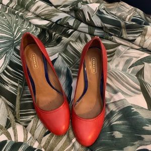 Round toe Coach pumps
